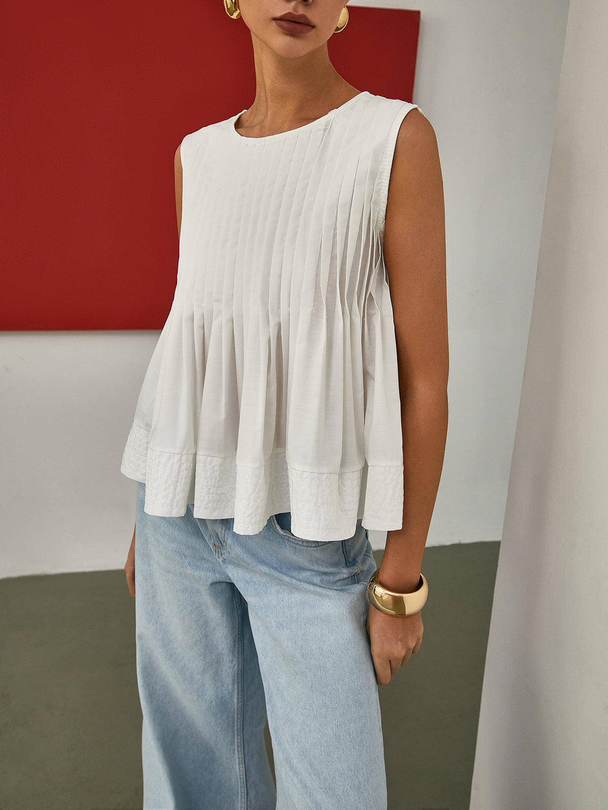 Ava – Pleated Peplum Sleeveless Blouse - Image 2